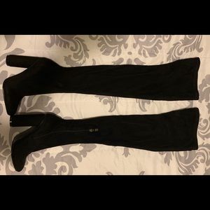 Thigh high black suede boots